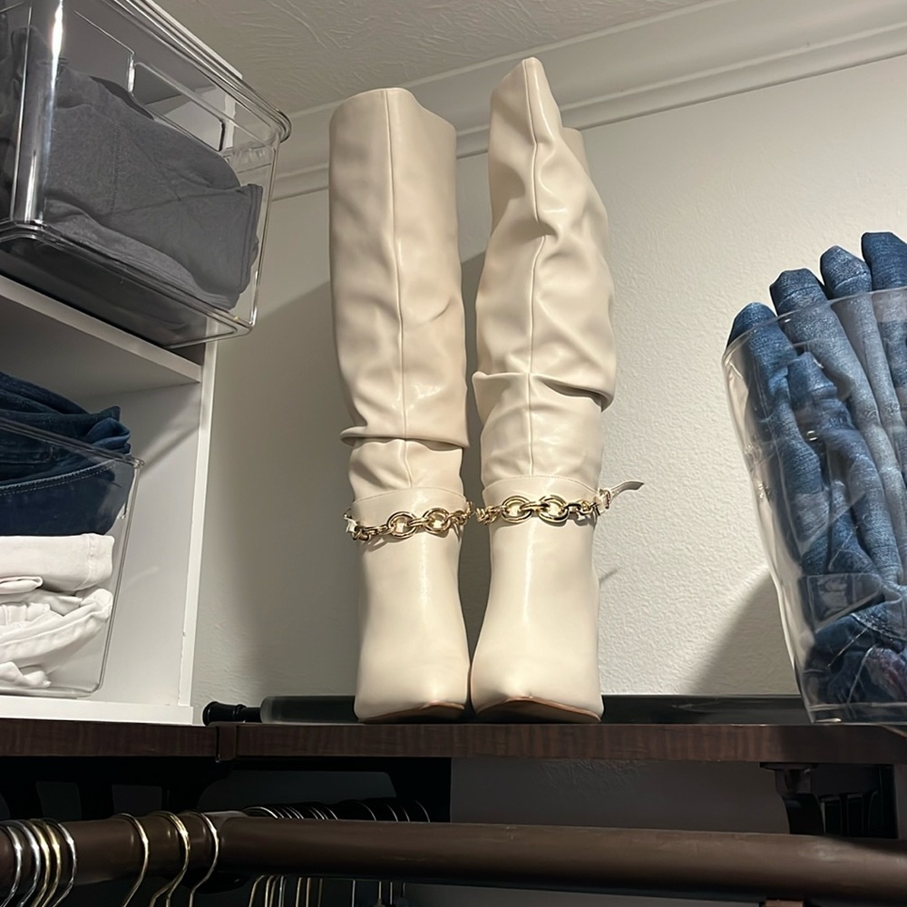 White knee high boots